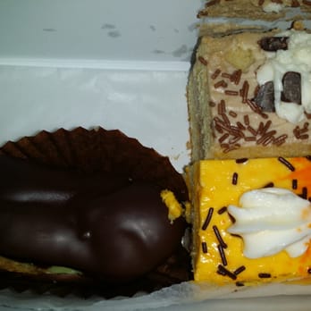 Classic Bakery & Cafe - Eclair, tiramisu, and an orange cake - Bakeries Near Me - Gaithersburg, Maryland Classic Bakery & Cafe - Eclair, tiramisu, and an orange cake - Bakeries Near Me - Gaithersburg, Maryland