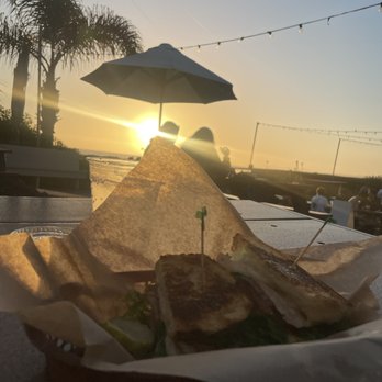 Padaro Beach Grill - This is the grill chicken sandwich with the sunset coming down - American Near Me - Carpinteria, California