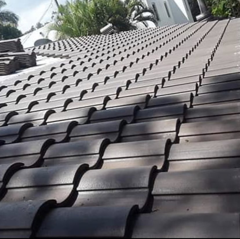 Slide of TBI Roofing