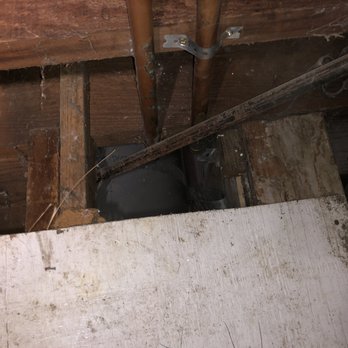 Rodent Proofing Intelligence - Copper pipes area underneath home where rodents can enter (before) - Pest Control Near Me Rodent Proofing Intelligence - Copper pipes area underneath home where rodents can enter (before) - Pest Control Near Me