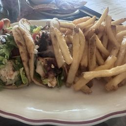 Chicken with feta, pita and fries Chicken with feta, pita and fries