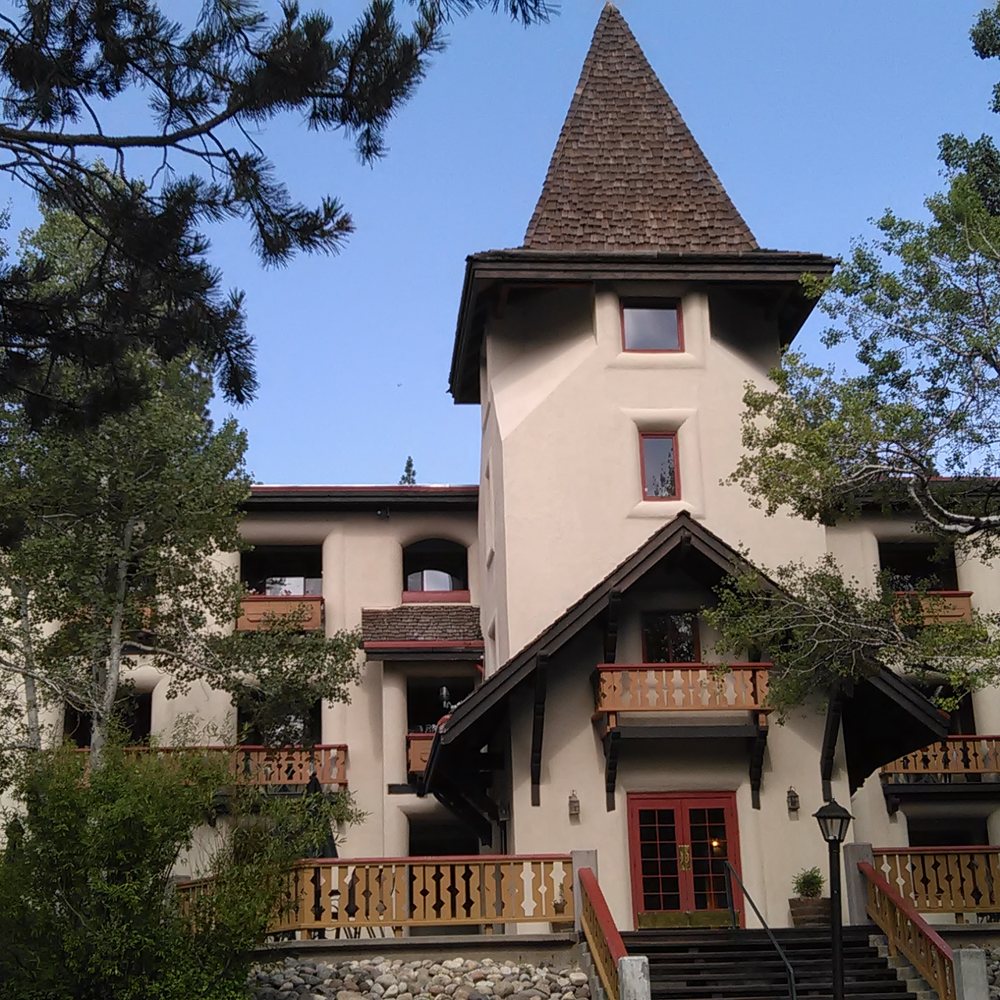 Olympic Village Inn - building from garden - Hotels Near Me - Olympic Valley, California