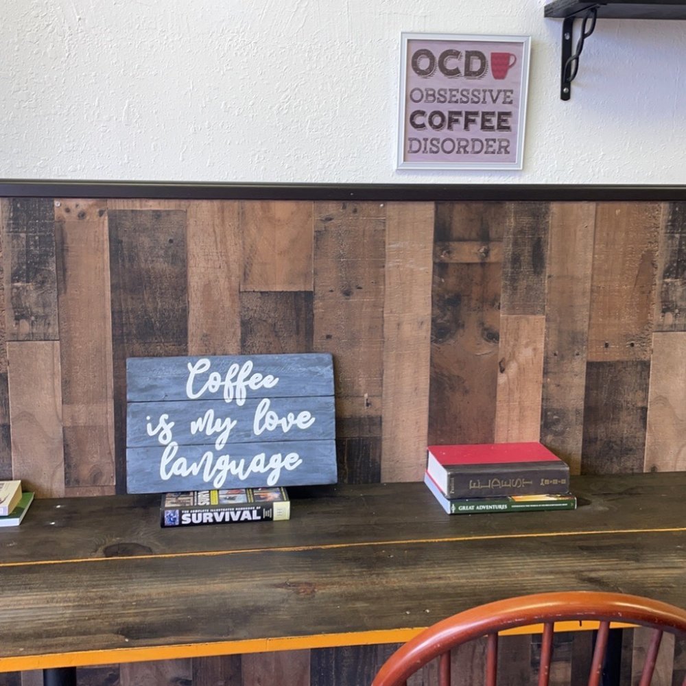 Southie Coffee - a wooden table with a sign on it - Coffee & Tea Near Me - Seminole, Florida Southie Coffee - a wooden table with a sign on it - Coffee & Tea Near Me - Seminole, Florida