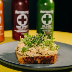 The Antidote Juice - Almond Chicken Salad on Toast; locally baked sourdough bread, topped with house-made chicken salad made with pasture-raised local chicken