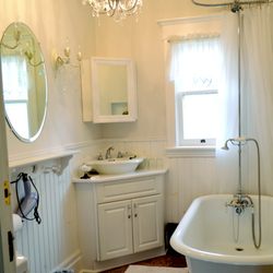Heart of Burlington Bed & Breakfast - Hearts Delght bathroom with claw foot tub and shower.