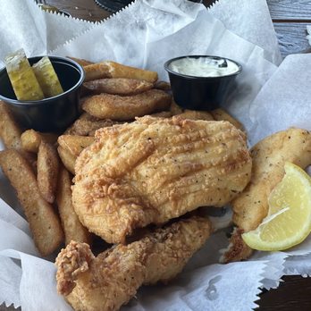 Caribbean Jack's - Fried fish basket with fries, pickles and tartar sauce - Caribbean Near Me - Daytona Beach, Florida Caribbean Jack's - Fried fish basket with fries, pickles and tartar sauce - Caribbean Near Me - Daytona Beach, Florida