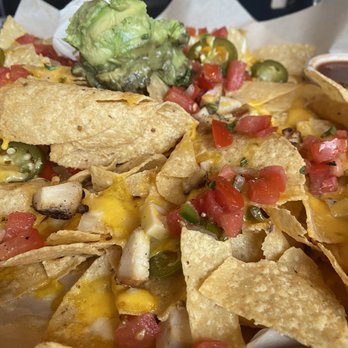 BJ's Restaurant & Brewhouse - Nachos - Breweries Near Me - Lansing, Michigan BJ's Restaurant & Brewhouse - Nachos - Breweries Near Me - Lansing, Michigan