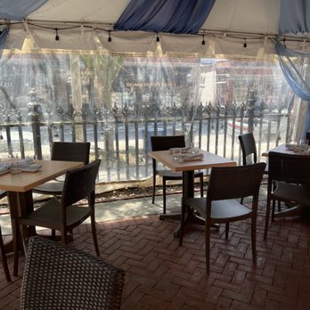 Bristol Oyster Bar - The tables and the view in the background. - Seafood Near Me - Bristol, Rhode Island Bristol Oyster Bar - The tables and the view in the background. - Seafood Near Me - Bristol, Rhode Island