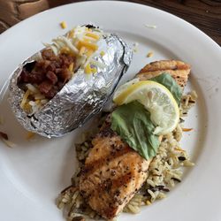 5D Steakhouse - Charbroiled salmon and loaded baked potato