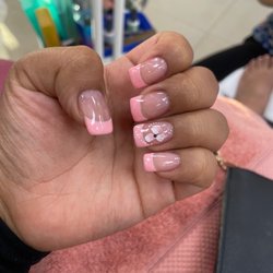 Le Mirage Hair & Nails Salon - Also she requested doing the whole flower thing. I did not request. But it's just not my liking.