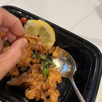 Thai Bite - Lemon Batter aka Lemon Chicken Note the thin crispy pieces of fried batter. - Thai Near Me - Aliso Viejo, California Thai Bite - Lemon Batter aka Lemon Chicken Note the thin crispy pieces of fried batter. - Thai Near Me - Aliso Viejo, California
