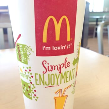 McDonald's - a paper cup with a drink in it - Burgers Near Me - Ocala, Florida McDonald's - a paper cup with a drink in it - Burgers Near Me - Ocala, Florida