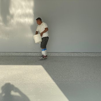 Superior Epoxy Flooring - Throwing flecks of color on floor. - Flooring Near Me - Redlands, California