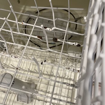 McLean Company - Rusted out dishwasher rack - Property Management Near Me - Palm Springs, California McLean Company - Rusted out dishwasher rack - Property Management Near Me - Palm Springs, California