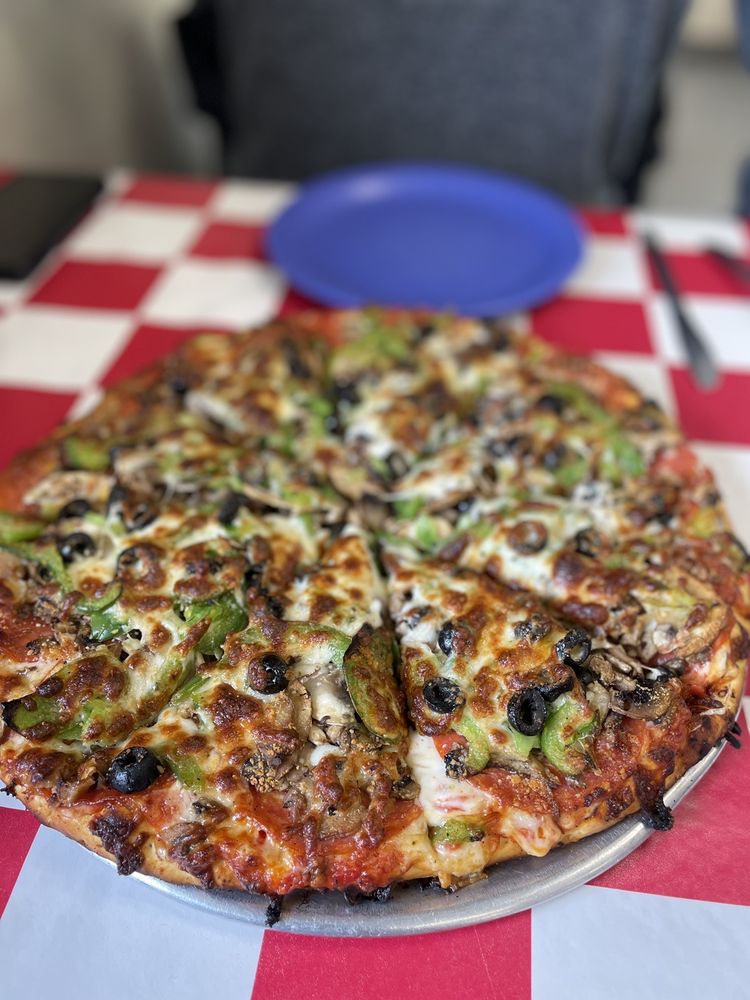 Annie's Pizza Station Logo