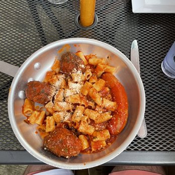 Carmelina's - Your pasta dish comes out in this skillet/pan - Italian Near Me - Boston, Massachusetts Carmelina's - Your pasta dish comes out in this skillet/pan - Italian Near Me - Boston, Massachusetts