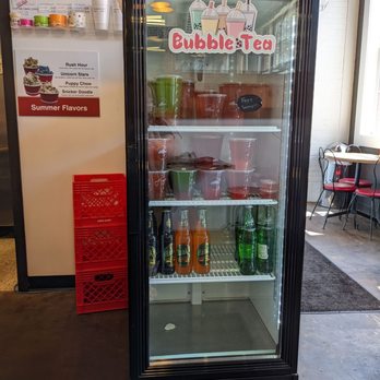 Rocket Science Ice Cream - a fridge with drinks in it - Ice Cream & Frozen Yogurt Near Me - Nappanee, Indiana