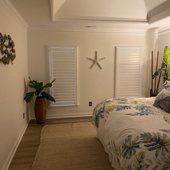 Bloomin' Blinds - Master Bedroom, 2 windows w/Bloomin Blinds plantation shutters,  closed view. Nice how they block out the light!!! - Shades & Blinds Near Me