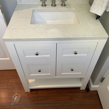 Bath Vanity Experts - Eternal Jasmine Pearl Backsplash- perfect match. - Kitchen & Bath Near Me