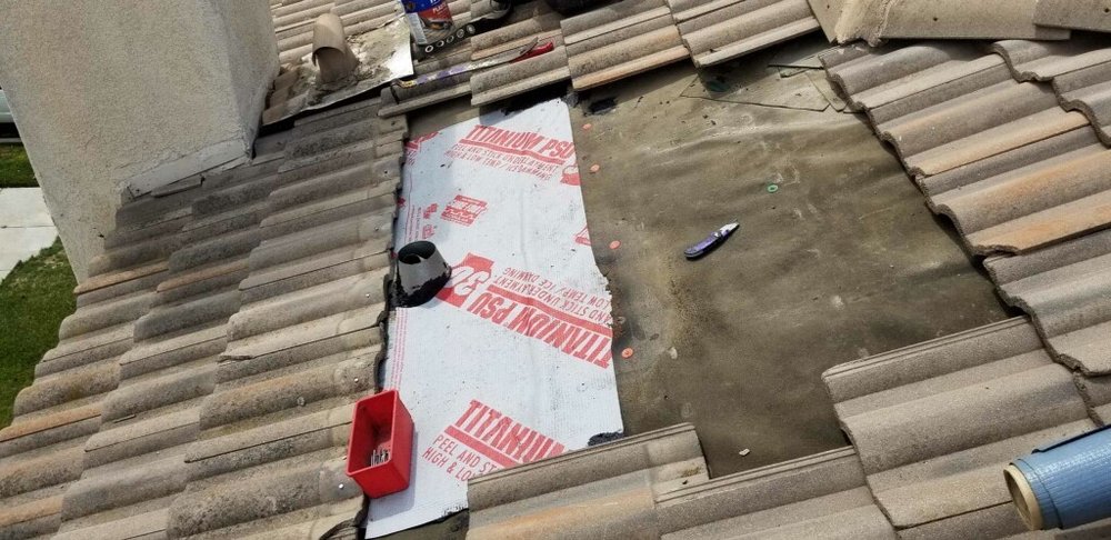 Slide of Kenney Roofing