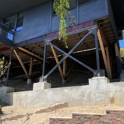 Foundation Repair LA - Retrofitted stilt home with caissons, grade beams and steel braced frame