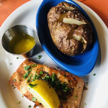 Campfire Grill - Grilled salmon with an unloaded baked potato, just salt and pepper with a little butter. - Bars Near Me - Flat Rock, North Carolina