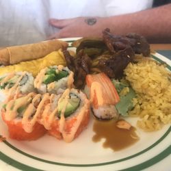 Spring Roll, Crab Rangoon, Various Sushi pieces, fried rice, beef entree.