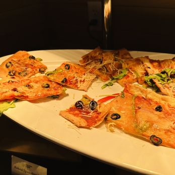 The Buffet - a platter of pizzas with olives and other toppings - Buffets Near Me - Delta, British Columbia The Buffet - a platter of pizzas with olives and other toppings - Buffets Near Me - Delta, British Columbia