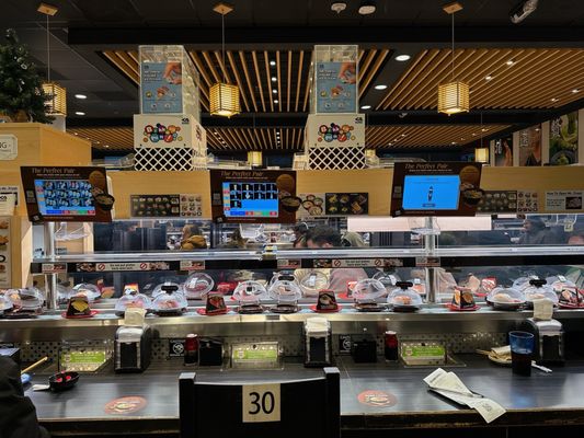 Kura Revolving Sushi Bar by null