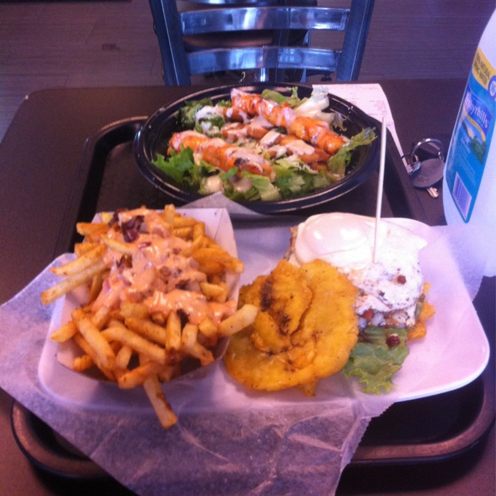 PINCHO - Tostone burger, Cajun fries, chicken Caesar poncho - Burgers Near Me - Miami, Florida PINCHO - Tostone burger, Cajun fries, chicken Caesar poncho - Burgers Near Me - Miami, Florida