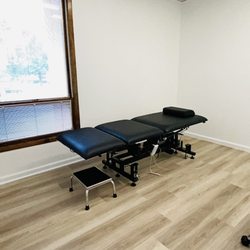 Spineck Physical Therapy - Private Examination room with an adjustable examination table at Spineck Physical Therapy, East Brunswick