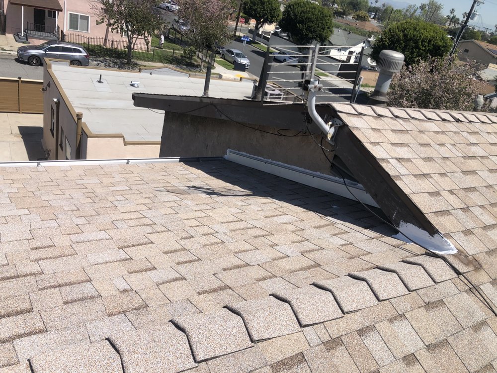 Slide of Martinez Roofing