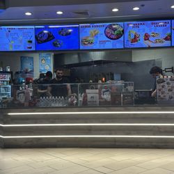 All of the workers on their phones. The line cook with his gloves he wraps the shawarma's with. Just nasty.
