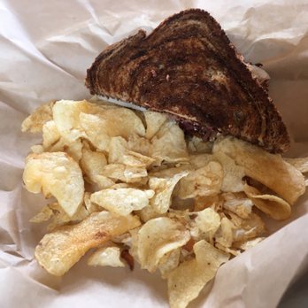 The Leaning Pear - 1/2 Corned Beef Reuben with chips - Sandwiches Near Me - Wimberley, Texas The Leaning Pear - 1/2 Corned Beef Reuben with chips - Sandwiches Near Me - Wimberley, Texas