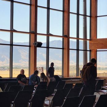 Ross Peak Grill - a group of people sitting in chairs in front of large windows - Burgers Near Me - Belgrade, Montana Ross Peak Grill - a group of people sitting in chairs in front of large windows - Burgers Near Me - Belgrade, Montana