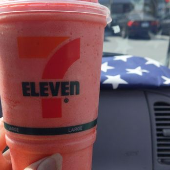 7-Eleven - a hand holding a pink drink with a straw - Convenience Stores Near Me - Salinas, California