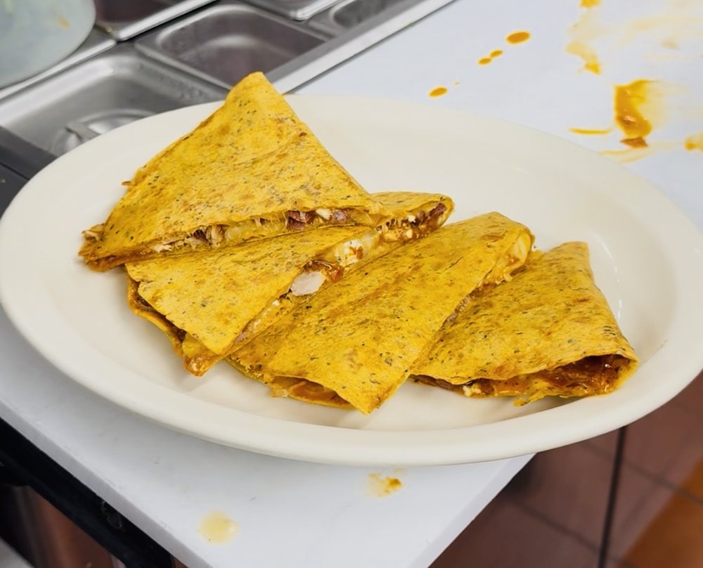 The Quirky Quesadilla Logo