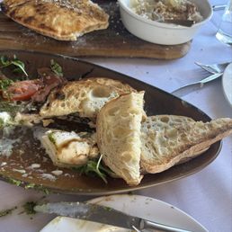 What's left of the caprese, flat bread & cheese w/honey & nuts. What's left of the caprese, flat bread & cheese w/honey & nuts.