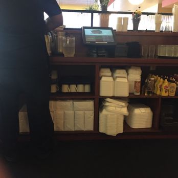 Broken Yolk Cafe - Nice coffee station with condiments and take out containers. - Breakfast & Brunch Near Me - Carlsbad, California Broken Yolk Cafe - Nice coffee station with condiments and take out containers. - Breakfast & Brunch Near Me - Carlsbad, California
