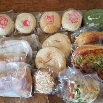 Yeh's Bakery - Mooncakes, green tea roll. Chicken roll, honey cake, scallion bread. Curry beef puff, wedding cake, scallion/pork shred roll. (LR) - Bakeries Near Me - Flushing, New York