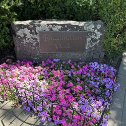 Imagination Park - Sign and beautiful floral display at the park