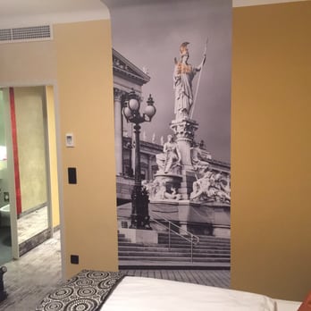 Hotel Capricorno - Trendy art work of the city on the wall. Parliament I think. - Hotels Near Me - Vienna, 9