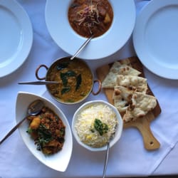 Bukhara Indian Restaurant of Double Bay - Aloo aubergine (eggplant), dahl (yellow lentils), chicken a la creole & garlic naan...these plates were licked clean. Delicious!