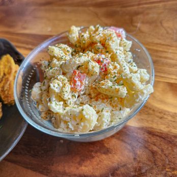 Piklìz - a bowl of potato salad and a plate of fried shrimp - Caribbean Near Me - Montreal, Quebec Piklìz - a bowl of potato salad and a plate of fried shrimp - Caribbean Near Me - Montreal, Quebec