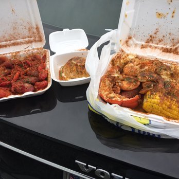 Crab Boss - Left to right: Crawfish bowl and LiL Nino combo: crab cake,lobster tail,jumbo shrimp,snow crab cluster,corn,potato,boiled egg - Cajun/Creole Near Me - Brandywine, Maryland