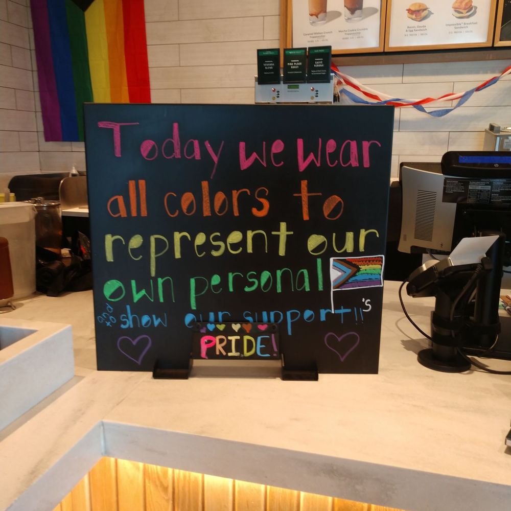 Starbucks - a sign that reads today we wear all colors to represent our own personality - Coffee & Tea Near Me - Myrtle Beach, South Carolina