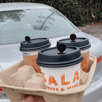 Sala Coffee & Wine - a person holding two coffee cups - Coffee & Tea Near Me - Whittier, California Sala Coffee & Wine - a person holding two coffee cups - Coffee & Tea Near Me - Whittier, California
