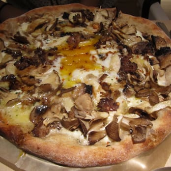 ABC Kitchen - Whole Wheat Pizza with Mushrooms, Parmesan, Oregano, and Farm Egg ($18). - Breakfast & Brunch Near Me - New York, New York