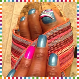 I had a great mani/pedi done by Ashley yesterday. She's meticulous with her craft and a genuinely sweet young lady. I had a great mani/pedi done by Ashley yesterday. She's meticulous with her craft and a genuinely sweet young lady.