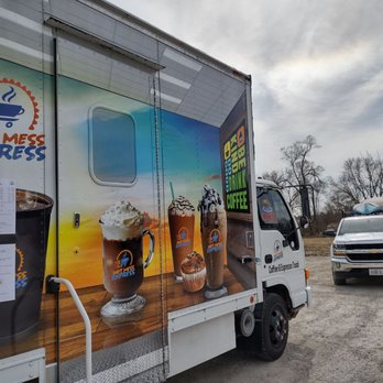 Hot Mess Express - a truck parked in a parking lot - Food Trucks Near Me Hot Mess Express - a truck parked in a parking lot - Food Trucks Near Me